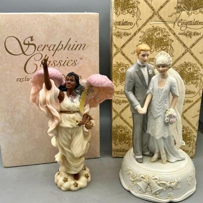 (2) Roman Figurines
Seraphim classics by Roman Celine The Morning Star and 'Everlasting Love' musical figurine 