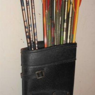 Leather quiver with arrows