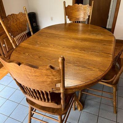 Oak Oval Pedestal Dining Table with Four Chairs $350
