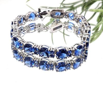 Lovely Tennis Bracelet w/ Blue Petalite Faceted Gems in Rhodium Covered Sterling Silver - 8.8mm gems - 7
