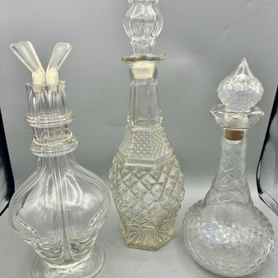 (3) Glass Decanters
Includes a 4 Chambered Czechoslovakian Glass Bottle Decanter 
