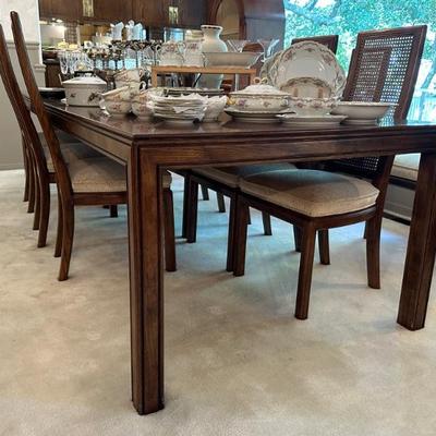 Henredon dining table with 10 matching chairs
