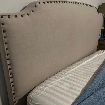 Upholstered Queen headboard and frame$200
