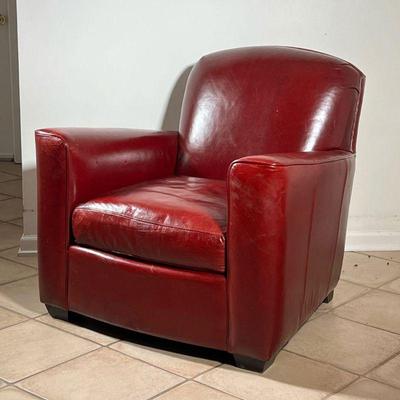 RED LEATHER ARMCHAIR | Large cushioned red leather armchair. - l. 36 x w. 36 x h. 36 in 