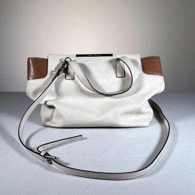 COCCINELLE CREAM LEATHER PURSE | Cream purse by Coccinelle with spacious tan interior. - l. 11 x w. 4 x h. 9 in 
