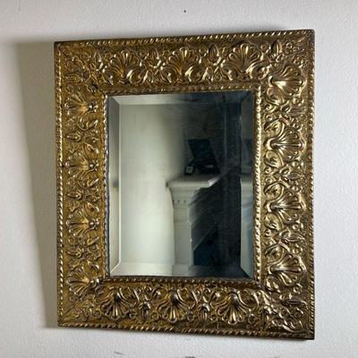 ANTIQUE MIRROR IN GILT FRAME | Beveled mirror in wood frame with gilt hammered tin face. - l. 13.75 x h. 15.5 in 