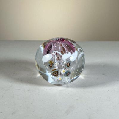 SIGNED ART GLASS PAPERWEIGHT | Glass orb with hand blown glass flowers and hollow center signed on bottom â€œMary Anow 11-81â€. - h. 3.5...
