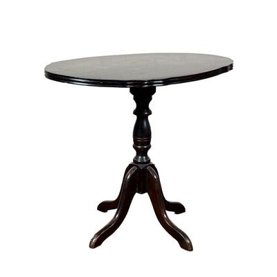 WOOD OVAL SIDE TABLE | Dark wood oval end table. - l. 24 x w. 16 x h. 19.74 in 