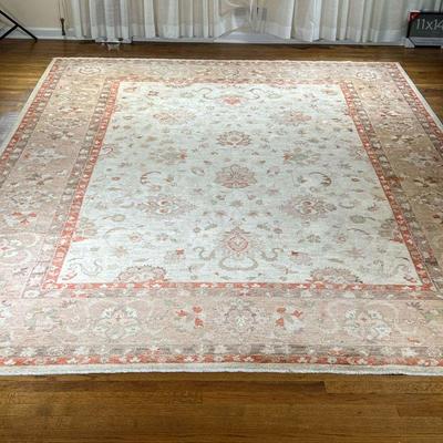 ORANGE AND WHITE RUG | Cream center with floral decoration and red clay border. - l. 147 x w. 108 in 