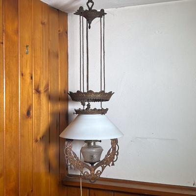HANGING OIL LAMP | 19th C Gilded iron hanging oil lamp with milk glass shade. Electrified, but not drilled. Unusual ornate design in iron...
