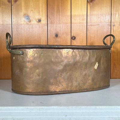 DOVETAILED COPPER POT | 19th C Dovetailed Copper Large Oval Cooking Pot with rolled top edges and Brass Handles. - l. 22 x w. 12 x h. 11...