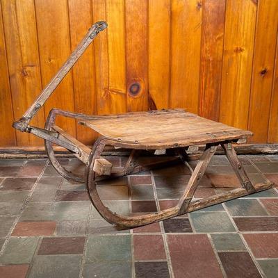 ICE SLED | A 19th C Working Ice Sled with great ironwork runners and handle brace. - l. 30 x w. 25 x h. 14 x dia. Without ha in 