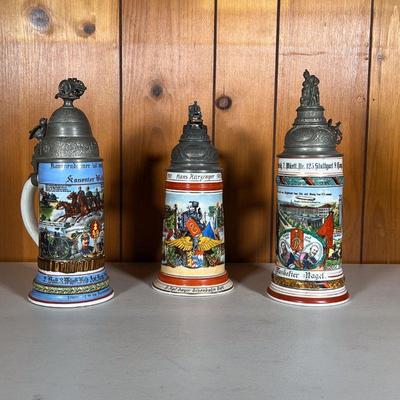 (3PC) GERMAN REGIMENTAL STEINS | Lot Includes: (1) Artillery with Cannon Dated 1908-1909 (1) Bridge Engineers with Train. Dated...
