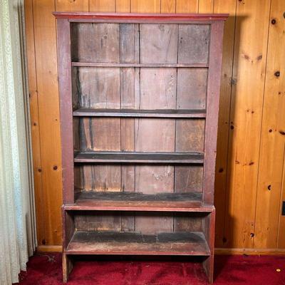 PRIMITIVE CUPBOARD IN RED PAINT | Open Country Cupboard in old dark red paint. One piece Pine construction. Inner back not painted....