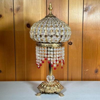 GOLD CRYSTAL TABLE LAMP | Outrageously Ornate Crystal Lamp having a gold base with a large crystal and a dome-shaped crystal pendant top...