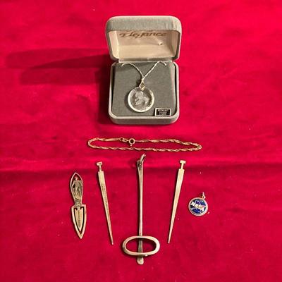 (7PC) STERLING SILVER & SWAROVSKI PENDANT | Sterling Silver Lot Includes: (1) Symbol Pendent. (2) Small Stakes. (1) Bookmark â€œSurf...