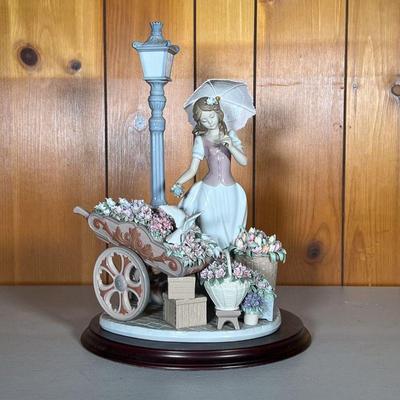 LLADRO FLOWERS FOR EVERYONE | Lladro â€œFlowers for Everyoneâ€ #6809, Flower Girl with cart. - l. 9.5 x w. 9 x h. 15.25 in 