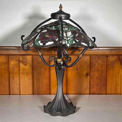 STAINED GLASS LAMP W/ RED FLOWERS | Stained Glass Table Lamp with ruffled base and three curved support bars over the shade. Shade has...