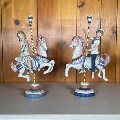 (2PC) LLADRO CAROUSEL HORSES | The Pair of Lladro Carousel Horses with Girl (1469) and Boy (1470). - l. 9 x w. 4 x h. 15.75 in (Girl) 