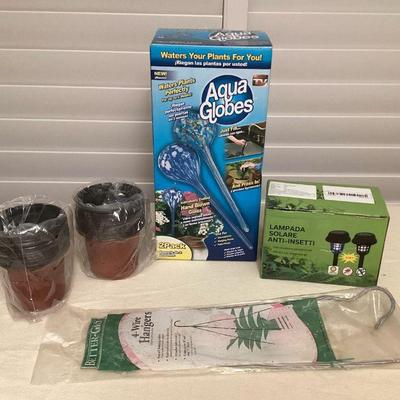 MTT033 Solar Bug Zappers, Aqua Globes, 40 Planter Pots & More!