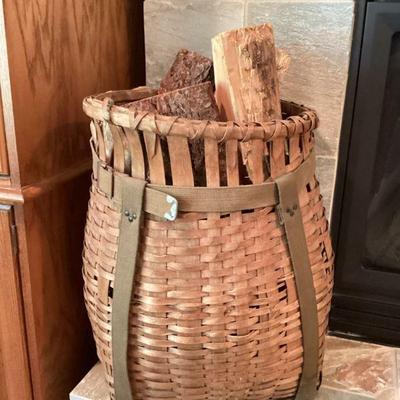 JOSW102 Large Vintage Basket Full Of Wood	Large rustic basket with back packing straps for hauling wood. Great way to store logs by the...