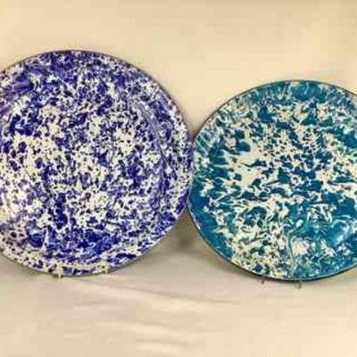 JIFI701 Vintage Extra Large Granite Ware Platters	Larger dark blue plate looks almost new. Smaller of the two, does have some wavey-ness...