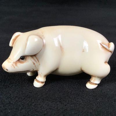 JIFI220 Signed Japanese Netsuke Pig Carving	Unable to identify the artist but definitely antique.
