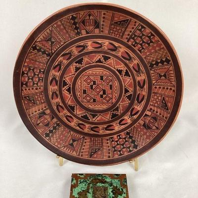 JIFI104 Peruvian Plate & Colombian Cigarette Box	This is a beautifully painted Peruvian clay plate and a pre-Columbian styled enameled...