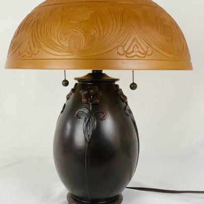 JIFI702 New Quoizel Teco Rossa Lamp	Quoizel Art Nouvea style, reproduction, lamp, straight out of the box. Bronze base and glass top.Â 
