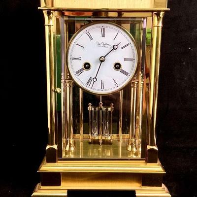 DONLAR913 Du Chateau Crystal Regulator Clock	Clock is very heavy, made ofÂ solid lacquered brass with crystal panels,Â 7-day wind, German...