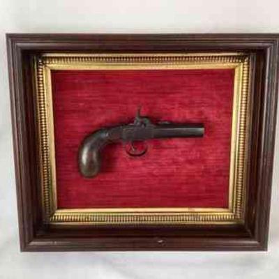 JIFI112 1850-1875 Derringer Style Firearm	This is a framed and mounted 1850-1875 derringer style blackpowder firearm pistol. This...
