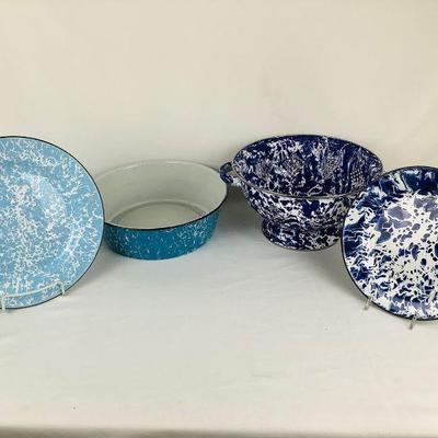 JIFI700 Blue + White Swirl Granite Ware	Assortment of enamel ware pieces. One large strainer, 2 plates, 1 bowl. Minimal ware, appropriate...