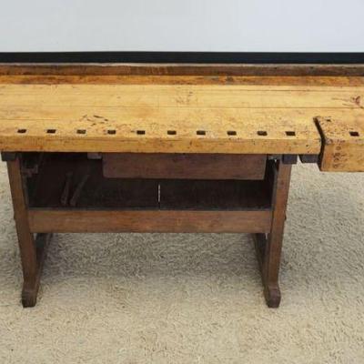1185	ANTIQUE WOOD WORKERS BENCH WITH WOOD VICE, 1 DRAWER AND 2 METAL BENCH DOGS, APPROXIMATELY 84 IN X 24 IN X 33 IN H
