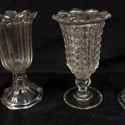 1144	LOT OF 4 ASSORTED FLINT GLASS PIECES, INCLUDING CELLERYS, CANDLESTICK, TALLEST APPROXIMATELY 9 IN H
