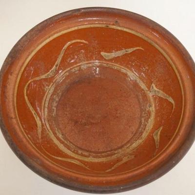 1023	SLIP DECORATED REDWARE BATTER BOWL, APPROXIMATELY 9 3/4 IN X 3 IN H
