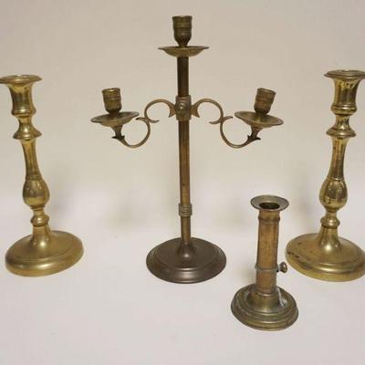 1002	GROUP OF ANTIQUE BRASS CANDLESTICKS, TALLEST APPROXIMATELY 15 IN, INCLUDING ONE PAIR & ONE ADJUSTABLE
