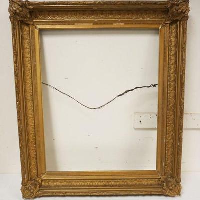 1270	ANTIQUE ORNATE GILT FINISHED FRAME, SOME LOSS TO GESSO, APPROXIMATELY OUTSIDE 34 IN X 39 IN, INSIDE 25 1/4 IN X 31 IN

