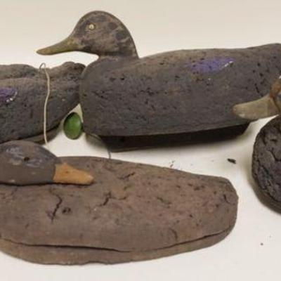 1076	LOT OF 4 CORK BODY DUCK DECOYS, LARGEST APPROXIMATELY 16 IN X 6 IN X 8 IN
