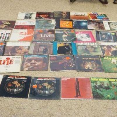1309	COLLECTION OF ROCK, JAZZ, ETC ALBUMS, ALBUMS HAVE ODOR FROM BEING STORED IN BASEMENT
