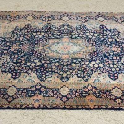 1215	PERSIAN RUG, APPROXIMATELY 105 IN X 68 IN

