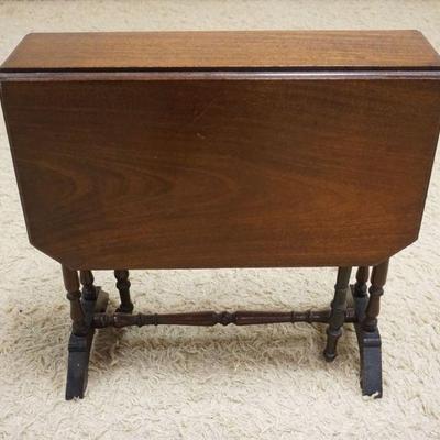 1216	ANTIQUE DIMINUATIVE MAHOGANY GATE LEG TABLE, APPROXIMATELY OPEN 31 IN X 24 IN X 24 IN H, CLOSED 7 IN X 24 IN X 24 IN H
