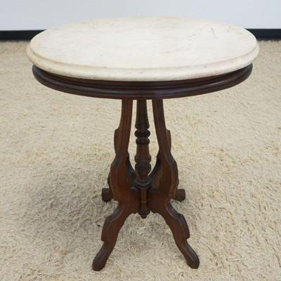 1210	VICTORIAN WALNUT OVAL MARBLE TOP PARLOR TABLE, APPROXIMATELY 23 IN X 17 IN X 29 IN H, 1 SIDE OF MARBLE HAS SOME CHIPPING
