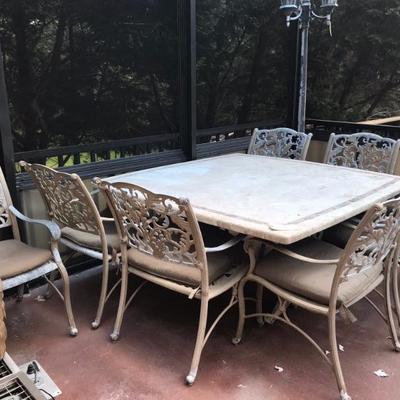 Table and set of 8 chairs $599