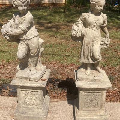 The seasons concrete statues