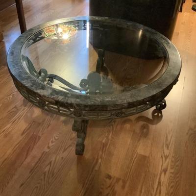 $139 Havertyâ€™s beveled glass, metal base coffee table 40â€diameter 17â€H 