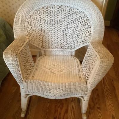 $65 white wicker rocker 36"H 31"W 35"depth