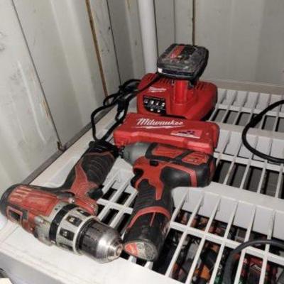 #4514 â€¢ Milwaukee Battery Charger, Battery and Drills
