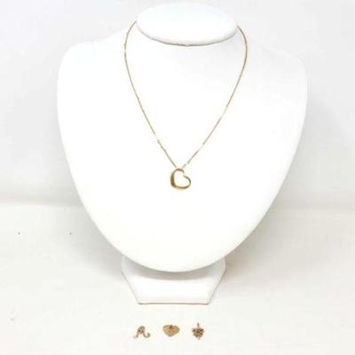 #702 â€¢ 14k Gold Necklace and Pendants, 4g

