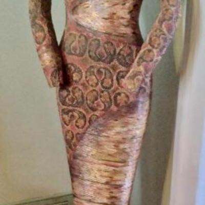 Beaded mannequin on stand 