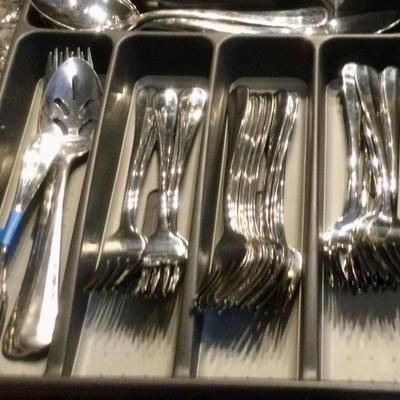 Lots of stainless flatware
